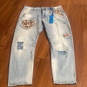 Distressed Light Blue Jeans with Leopard Patches